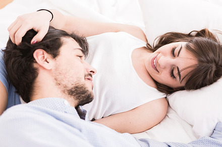 On bed stock photo containing bed and young, a Person Photo by fotopitu