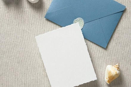 Nautical wedding invitation card and envelope with seashells and blue flowers o, a Holiday Photo by photoguns