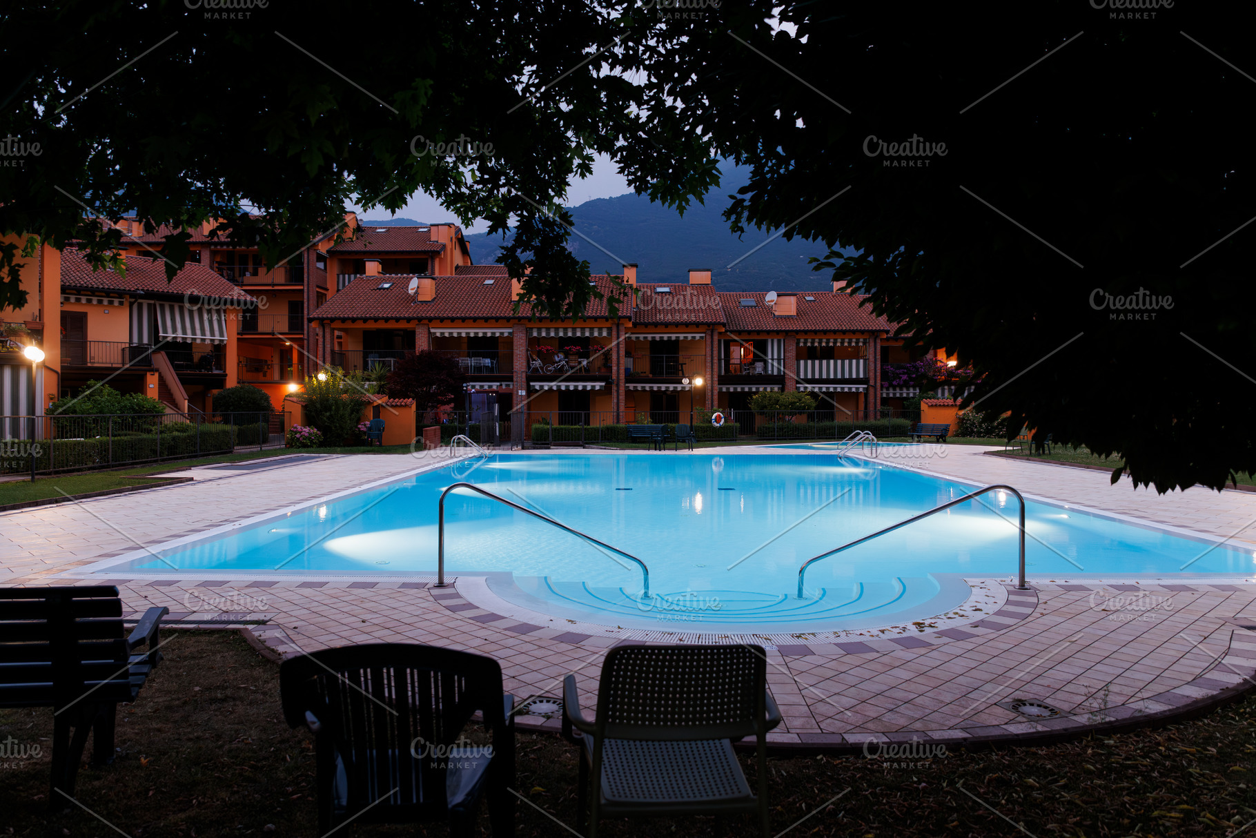 Outdoor pool in a modern apartment complex, an Architecture Photo by Bepslabor