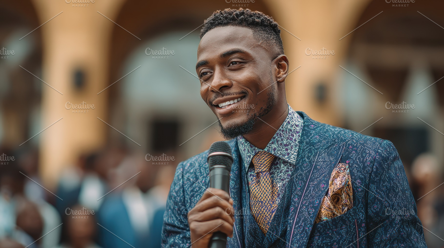 Smiling man speaking into microphone, a Photo by Pixeness Studio