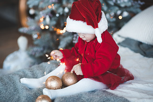 Cute baby over Christmas decor