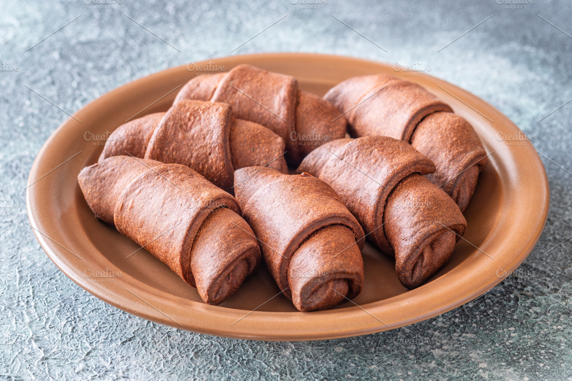 Fresh chocolate croissants, a Food & Drink Photo by Alexander Prokopenko