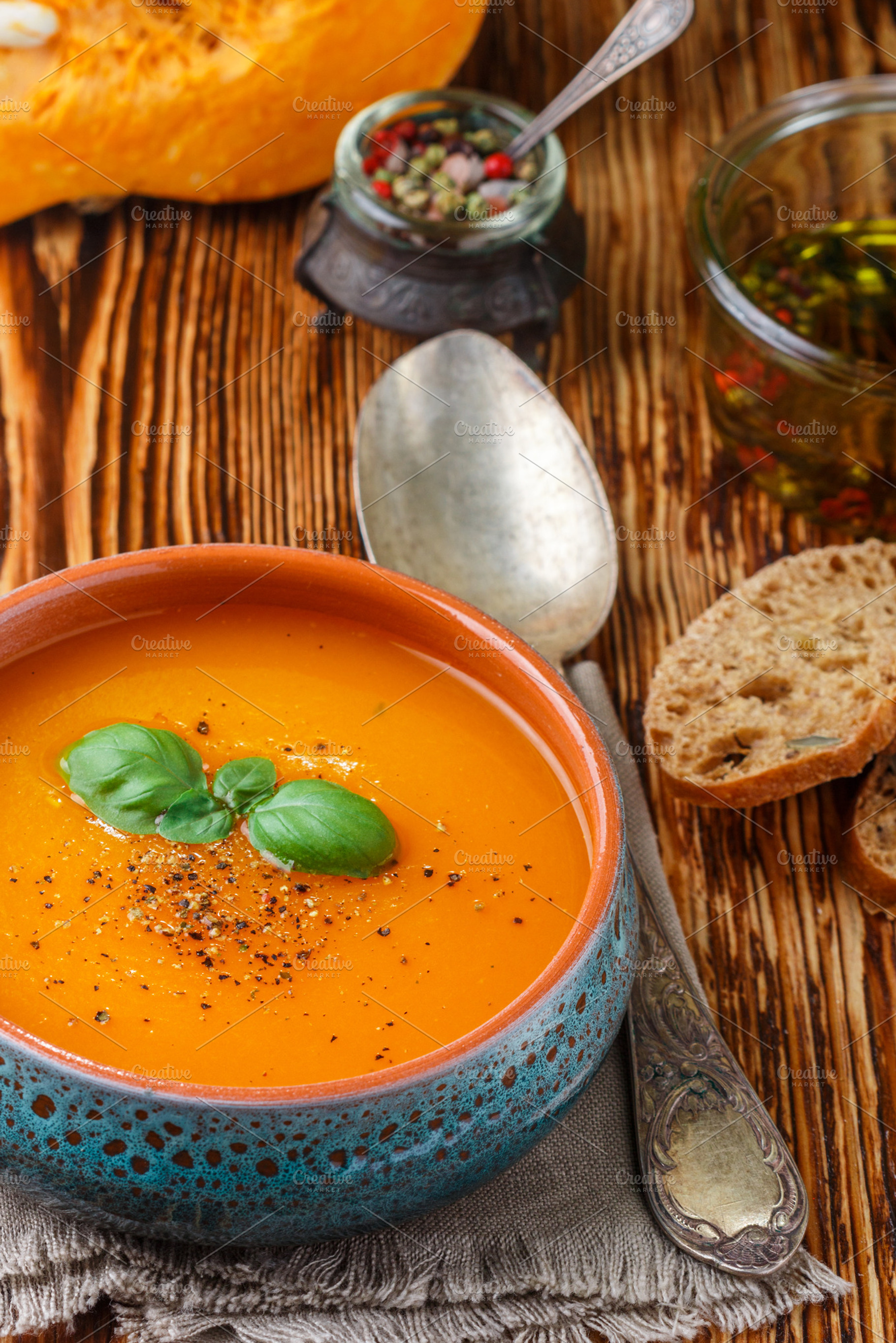 Pumpkin soup containing basil, autumn, and background, a Food & Drink Photo by La_Vanda