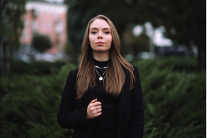 Young stylish woman in black coat, a Beauty & Fashion Photo by Red Hot Chili Pepper Shop