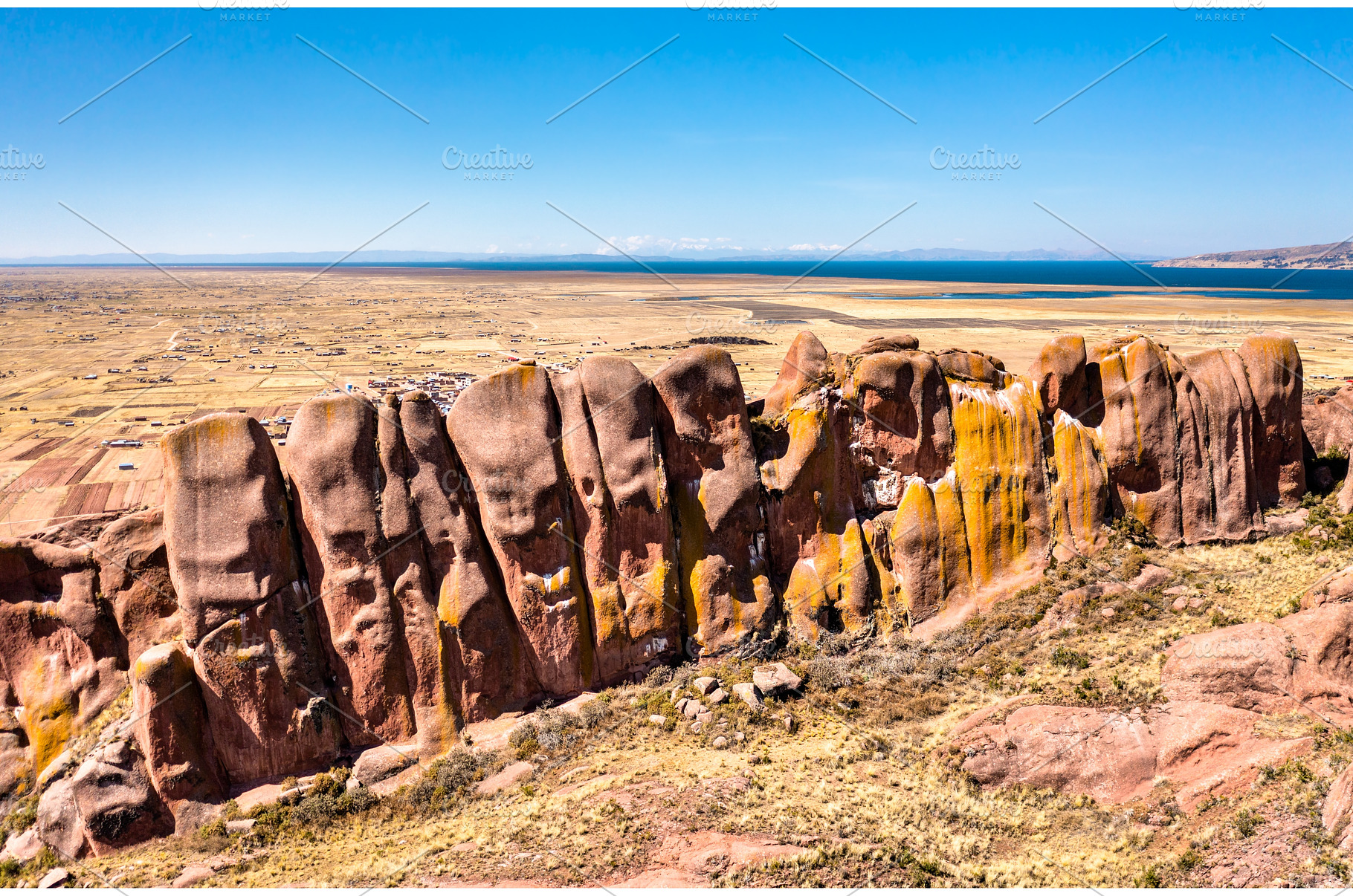 Reddish rock formations in Aramu, an Architecture Photo by Leonid Andronov