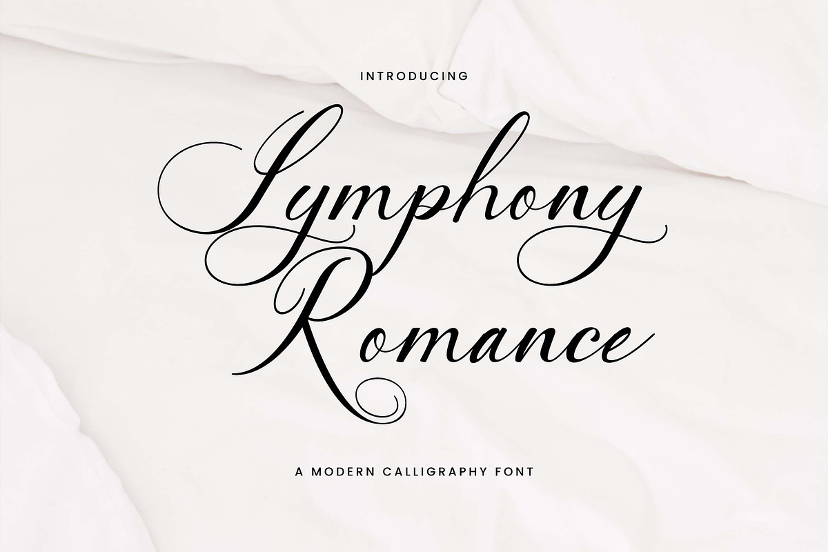 Symphony Romance Calligraphy Font, a Handwritten Font by UICreative (Photo 1 of 13)