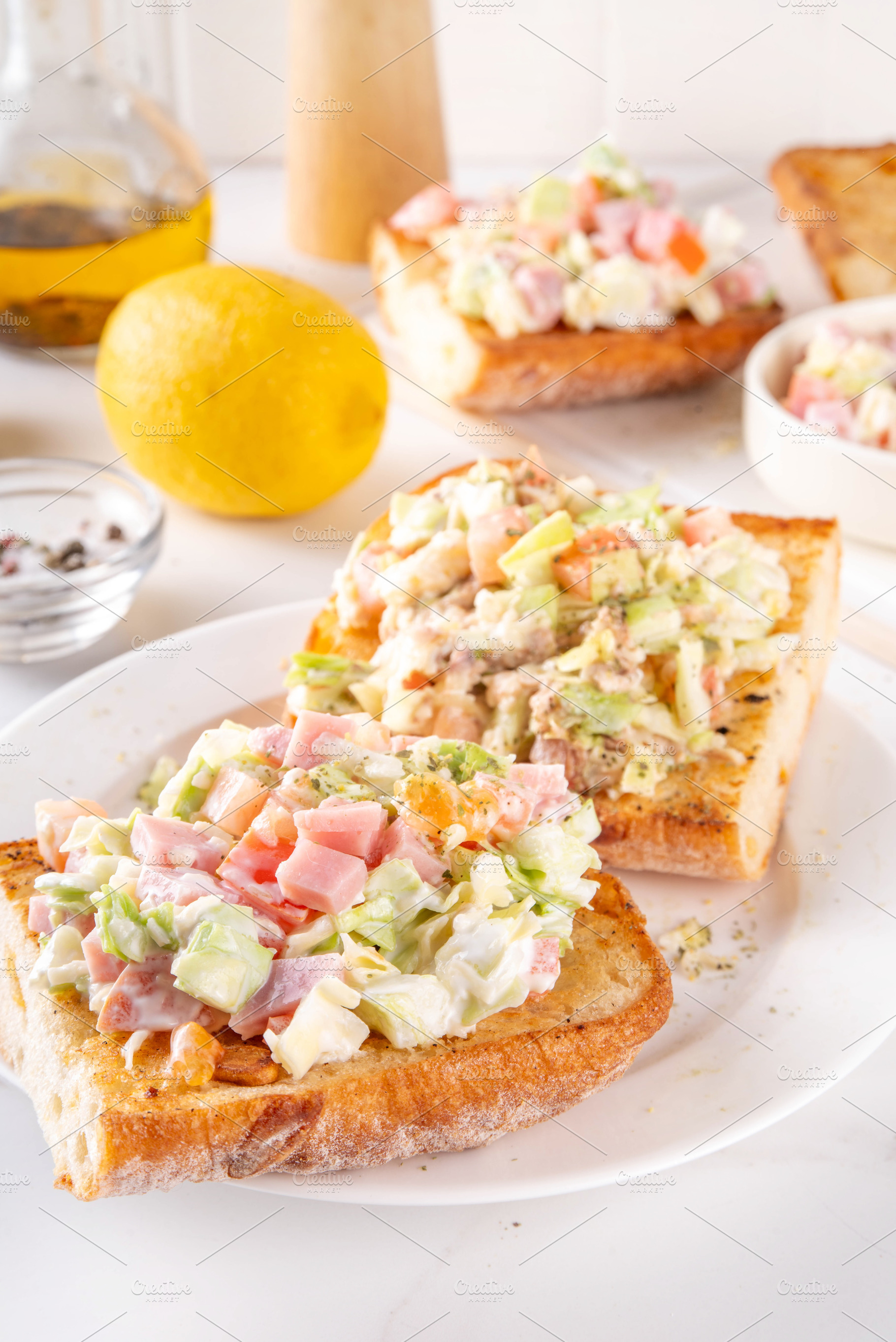 Viral Chopped Italian Sandwiches with salad and cheese, a Food & Drink Photo by Rimma