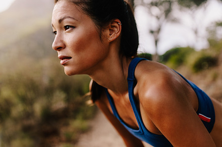 Female runner in sportswear containing asian, athlete, and beautiful, a Sports & Recreation Photo by Jacob Lund