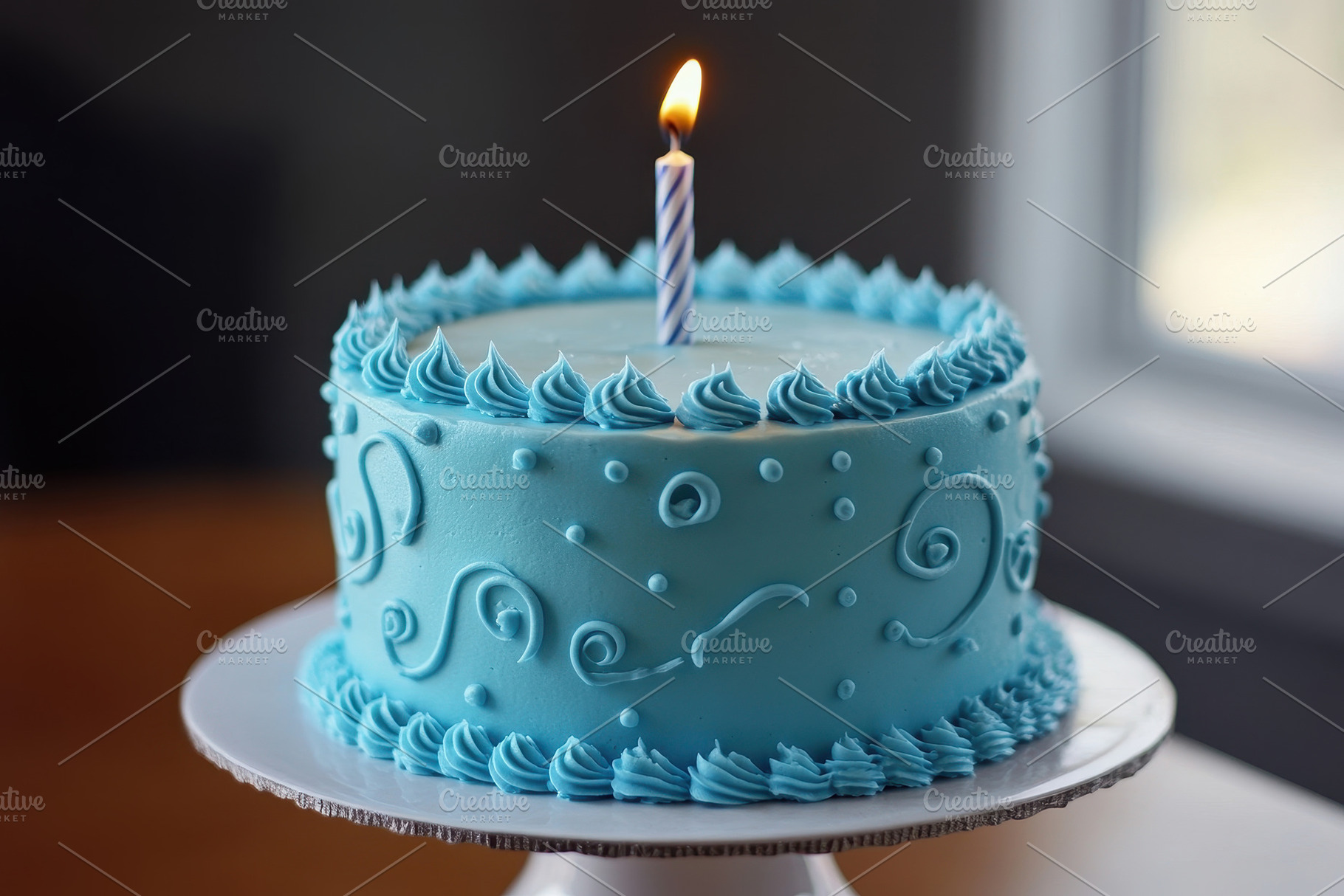 Beautiful blue birthday cake with ca, a Photo by Tanuart