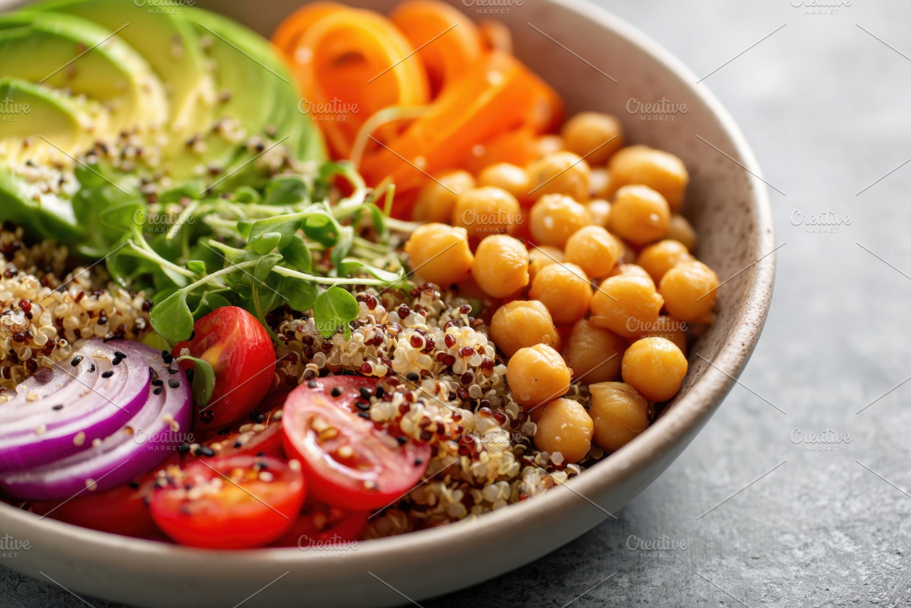 Vibrant quinoa salad with butternut squash and arugula, a Food & Drink Photo by AlyaAnd