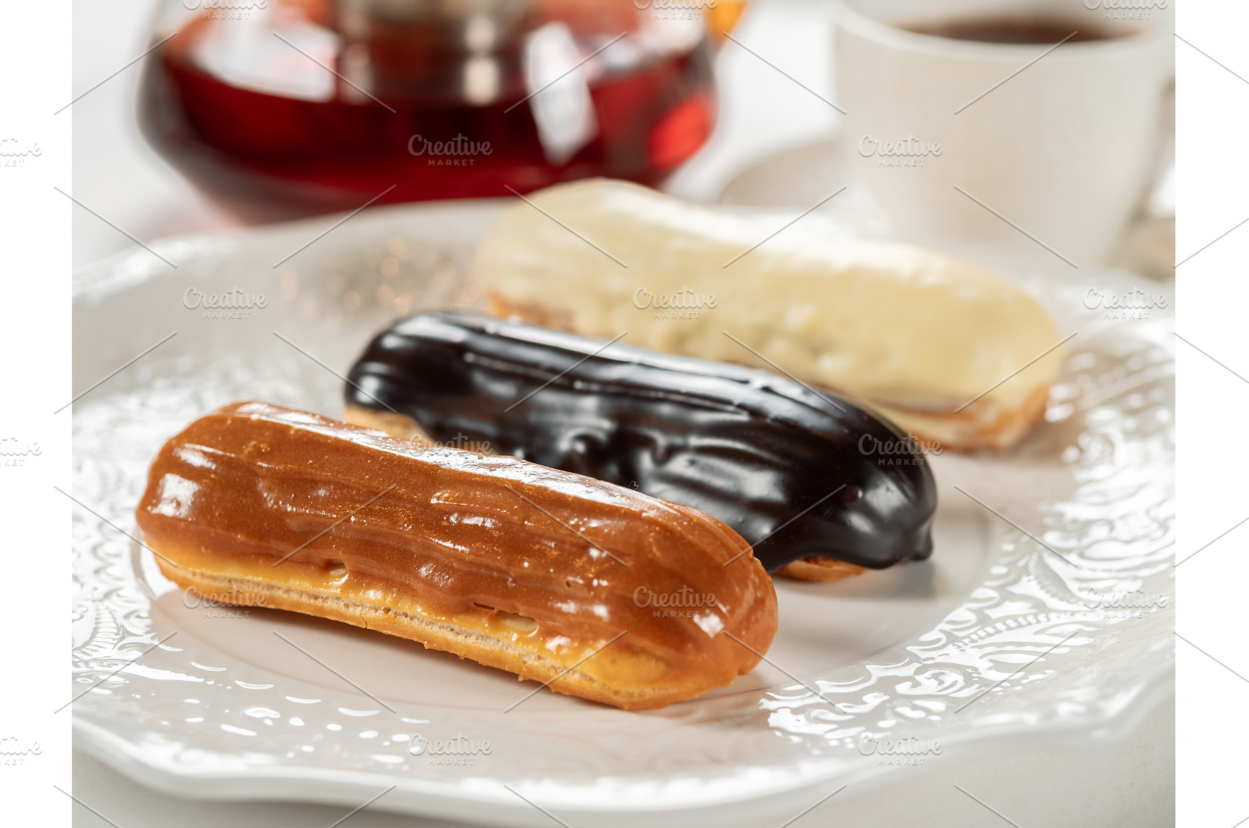 Group of french dessert Eclair on, a Food & Drink Photo by Fascinadora