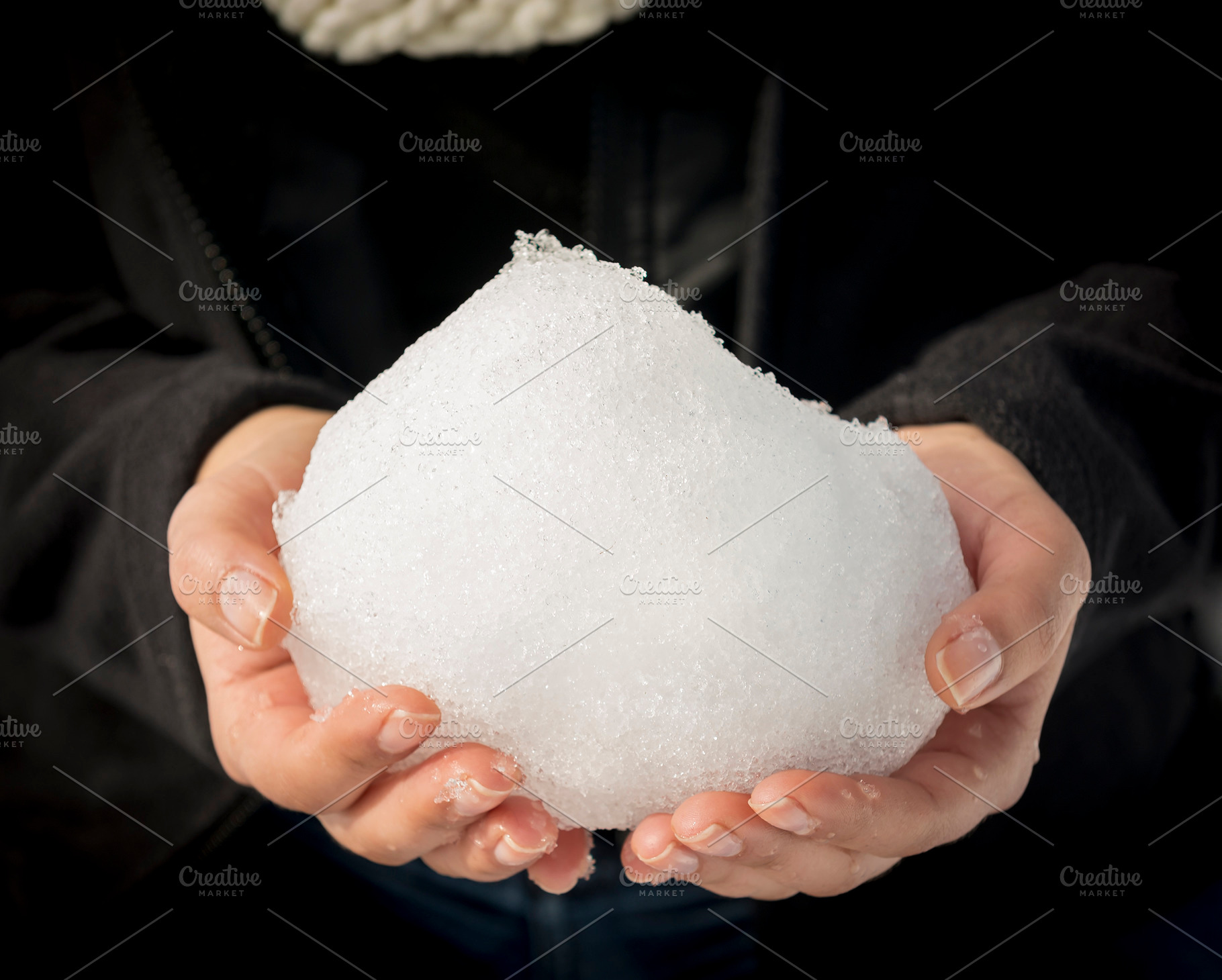 Woman Holding A Snowball, a Person Photo by THP Creative