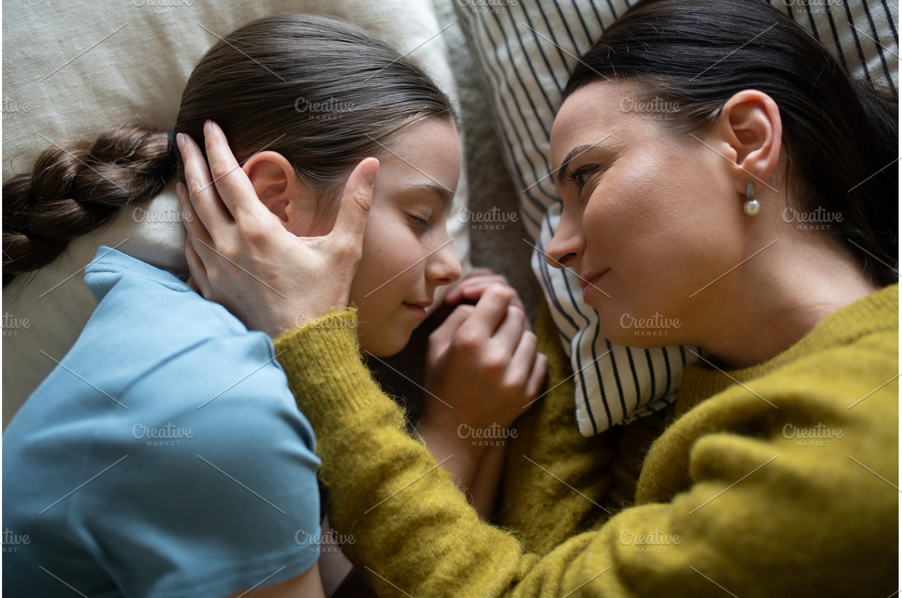 Top view of girl and mom talking in, a Person Photo by HalfPoint