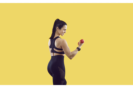 Toned woman athlete training with, a Sports & Recreation Photo by StudioRomantic
