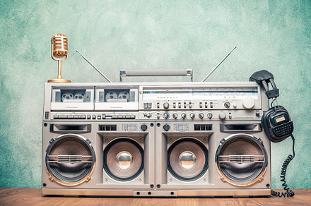 Retro boombox, mic and headphones