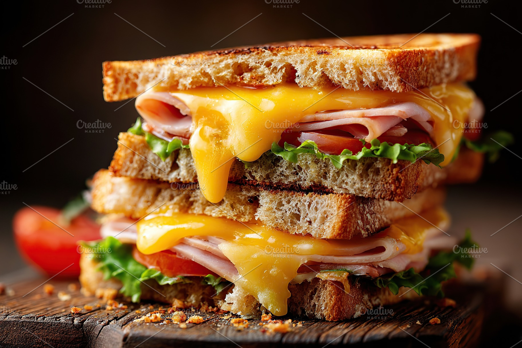 Delicious sandwiches with golden melted cheese and fresh ingredients stacked hi, a Food & Drink Photo by AlyaAnd