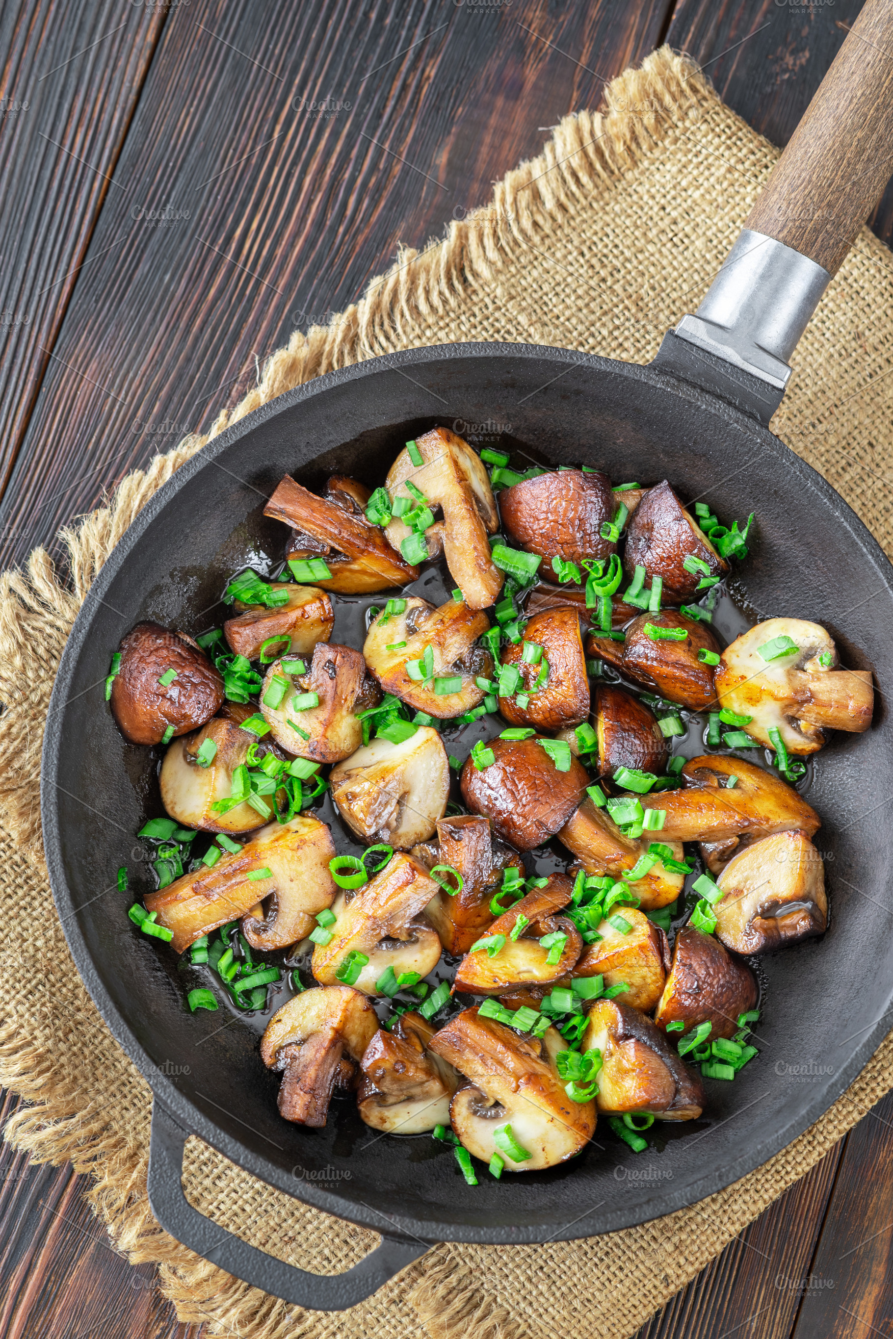Sauteed brown champignon mushrooms w, a Food & Drink Photo by Alexander Prokopenko