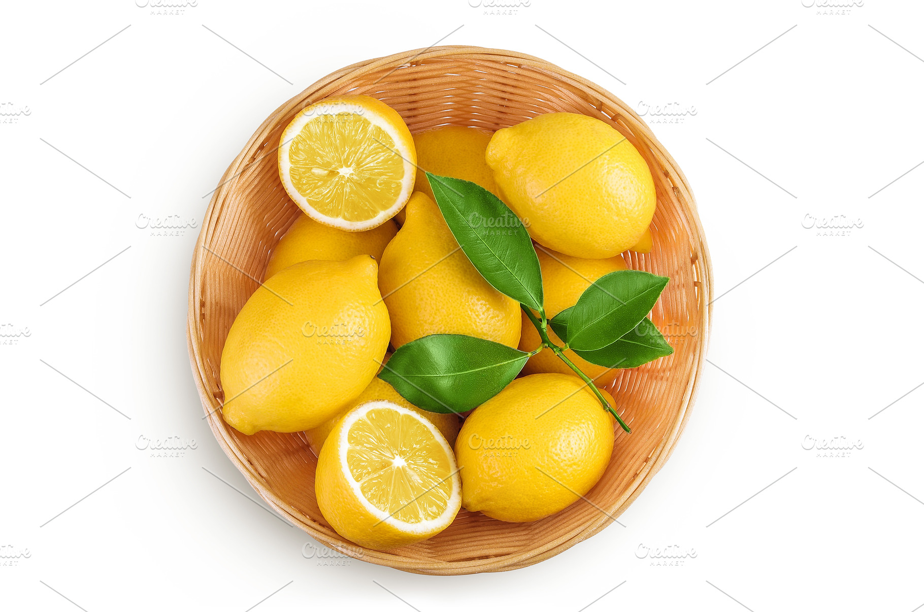 Ripe lemons in wicker basket, a Food & Drink Photo by NataPhoto