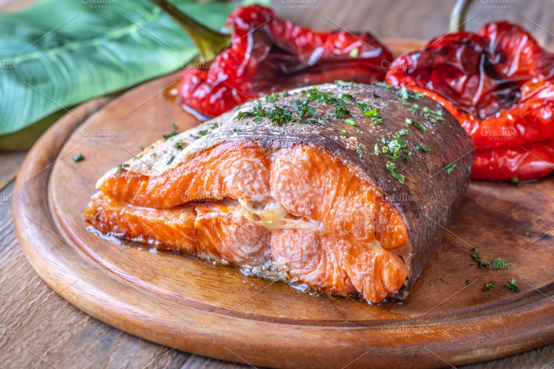 Baked Salmon with Bell Peppers on Rustic Wooden Cutting Board, a Food & Drink Photo by Alexander Prokopenko
