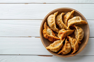 Homemade fried meat dumplings on wooden table, a Food & Drink Photo by AlyaAnd
