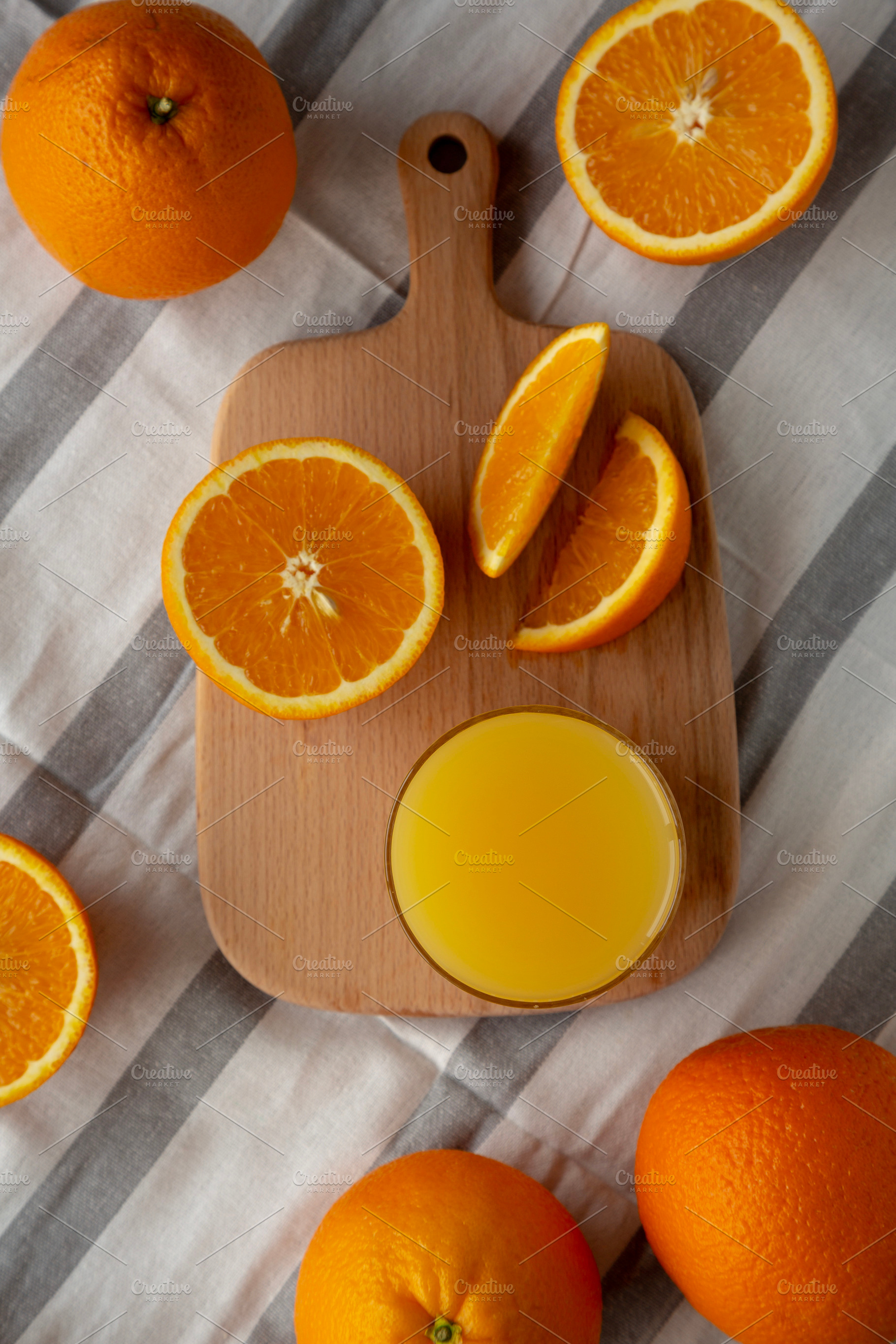 Organic Orange Juice in a Glass, top view. Overhead, from above,, a Food & Drink Photo by LiudmylaChuhunova