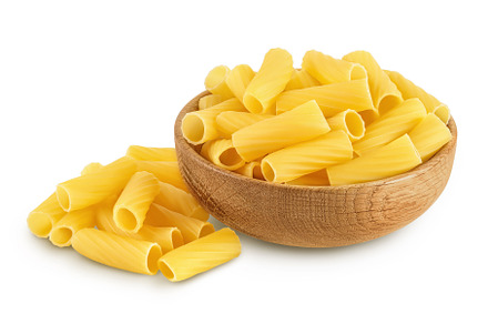 raw italian Rigatoni pasta in wooden, a Food & Drink Photo by NataPhoto