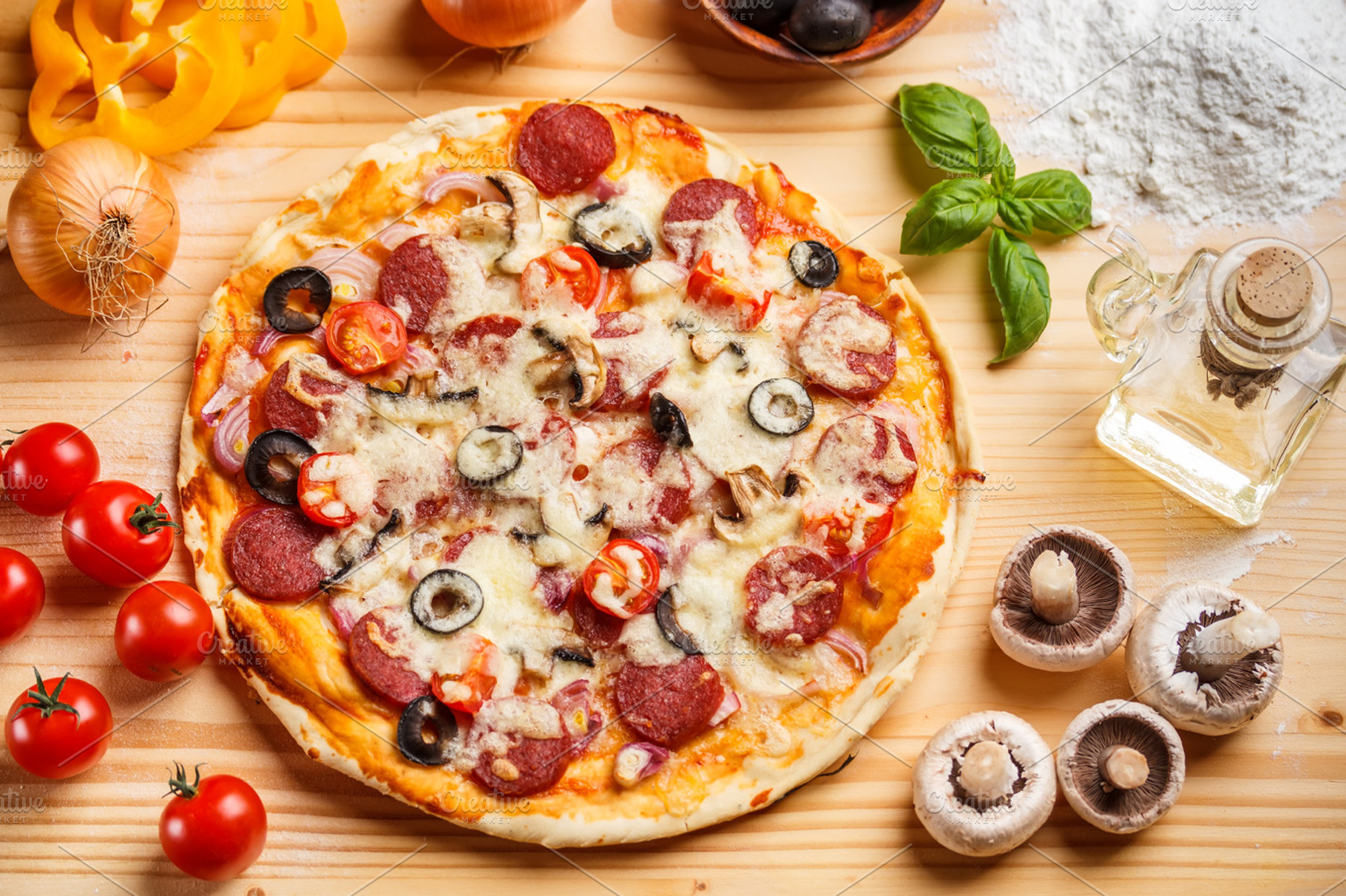 Whole baked pizza featuring pizza, pepperoni, and salami