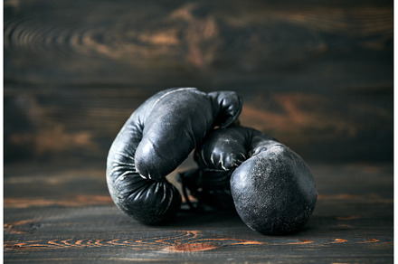Old boxing gloves on wooden, a Sports & Recreation Photo by Gladkov photography