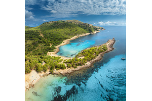 Aerial view of Cala Agulla beach, a Nature Photo by den-belitsky
