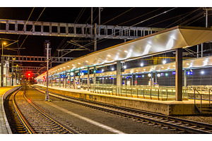Austrian railway station feldkirch at night stock photo containing train and, a Transportation Photo by Leonid Andronov