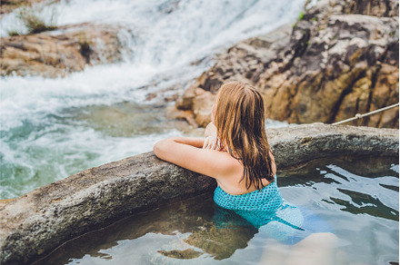 Geothermal spa. Woman relaxing in, a Nature Photo by Elizaveta Galitskaya