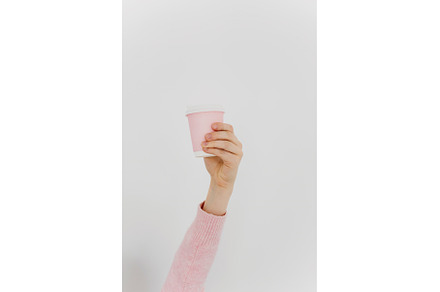 Cropped image of woman hand holding, a Food & Drink Photo by Aliona Serzhanova