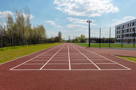 Running track and a soccer field, a Sports & Recreation Photo by FedotovAnatoly