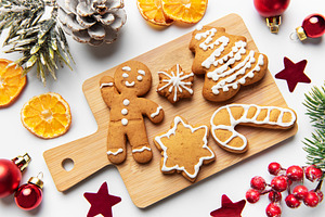 Gingerbread cookies arranged on cutting board with christmas dec, a Holiday Photo by Olena Rudo