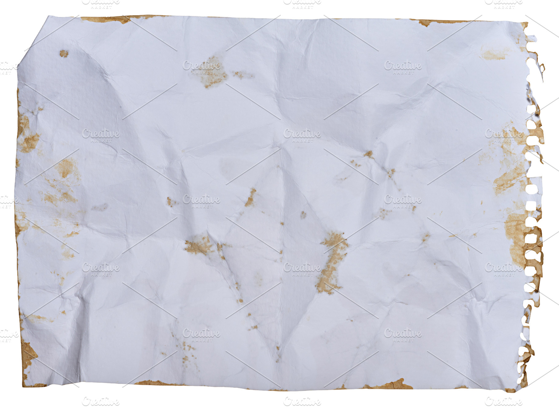 White crumpled sheet of notebook paper, torn edge with spring ho, an Abstract Photo by ndanko