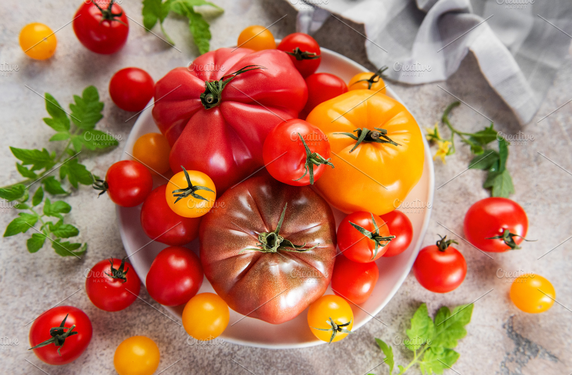 Fresh organic heirloom tomatoes from garden harvest, a Food & Drink Photo by Olena Rudo