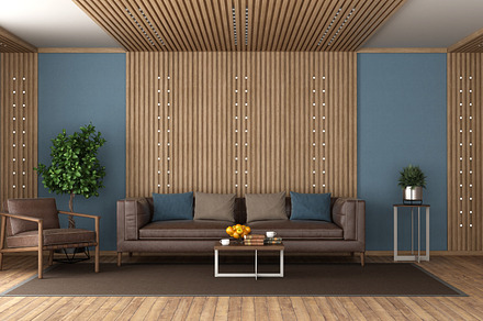 Living room with leather sofa room and wood paneling, an Architecture Photo by Archideaphoto