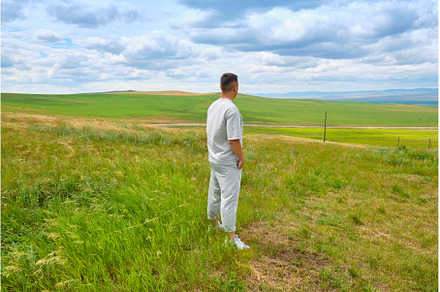A man in light-colored clothes