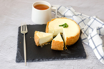 Piece of classical Cheesecake New York Closeup View, a Food & Drink Photo by vimart