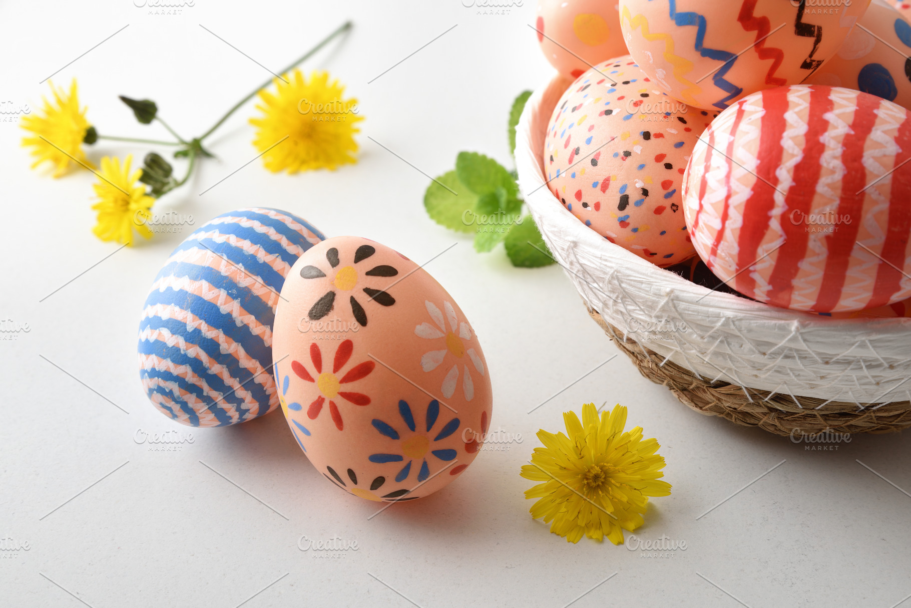 Colorful Easter Eggs in Basket with Flowers, a Holiday Photo by Davizro's Market