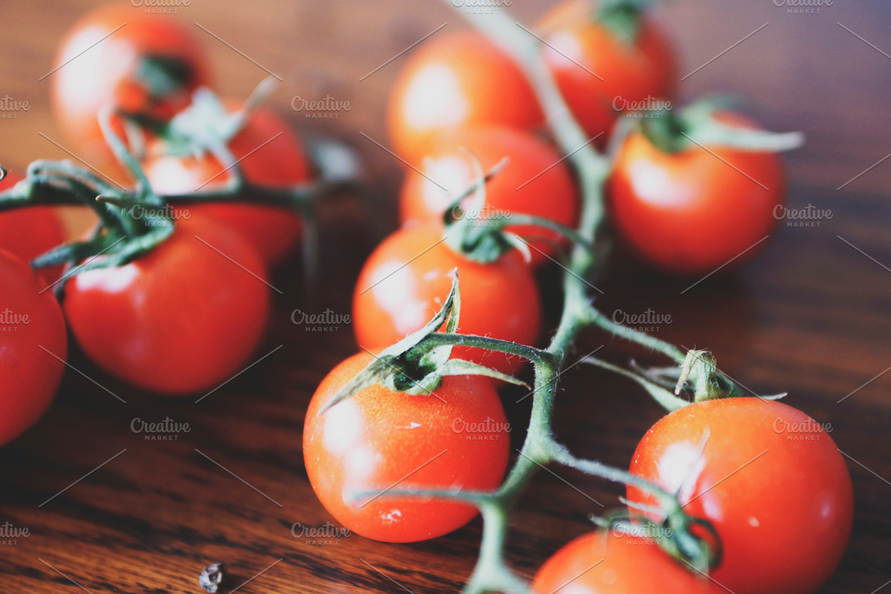 Branch of tomatoes featuring fresh, food, and background, a Food & Drink Photo by Nazar Hrabovyi
