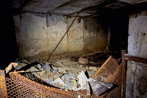 Abandoned room in dark underground shelter, an Architecture Photo by Vapi