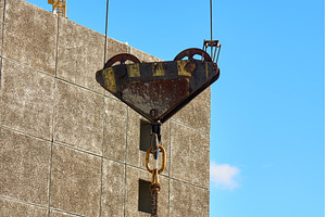 Heavy crane hook hangs from cable, an Industrial Photo by darksoul72