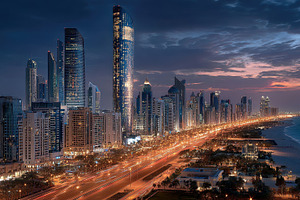 Night view of Dubai skyscrapers coas, a Photo by Pixeness Studio