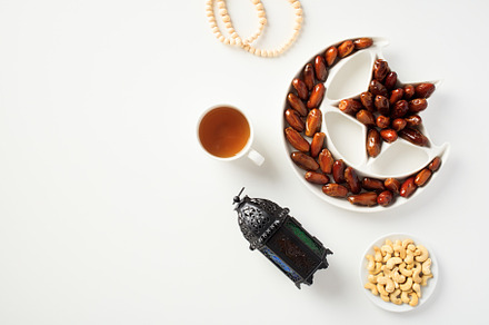 Ramadan Kareem concept. Flat lay composition with dried dates, Islamic lantern,, a Holiday Photo by photoguns