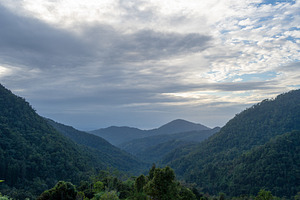 Mountain landscape near Tentena in Sulawesi, Indonesia under clo, a Nature Photo by GoodGoods