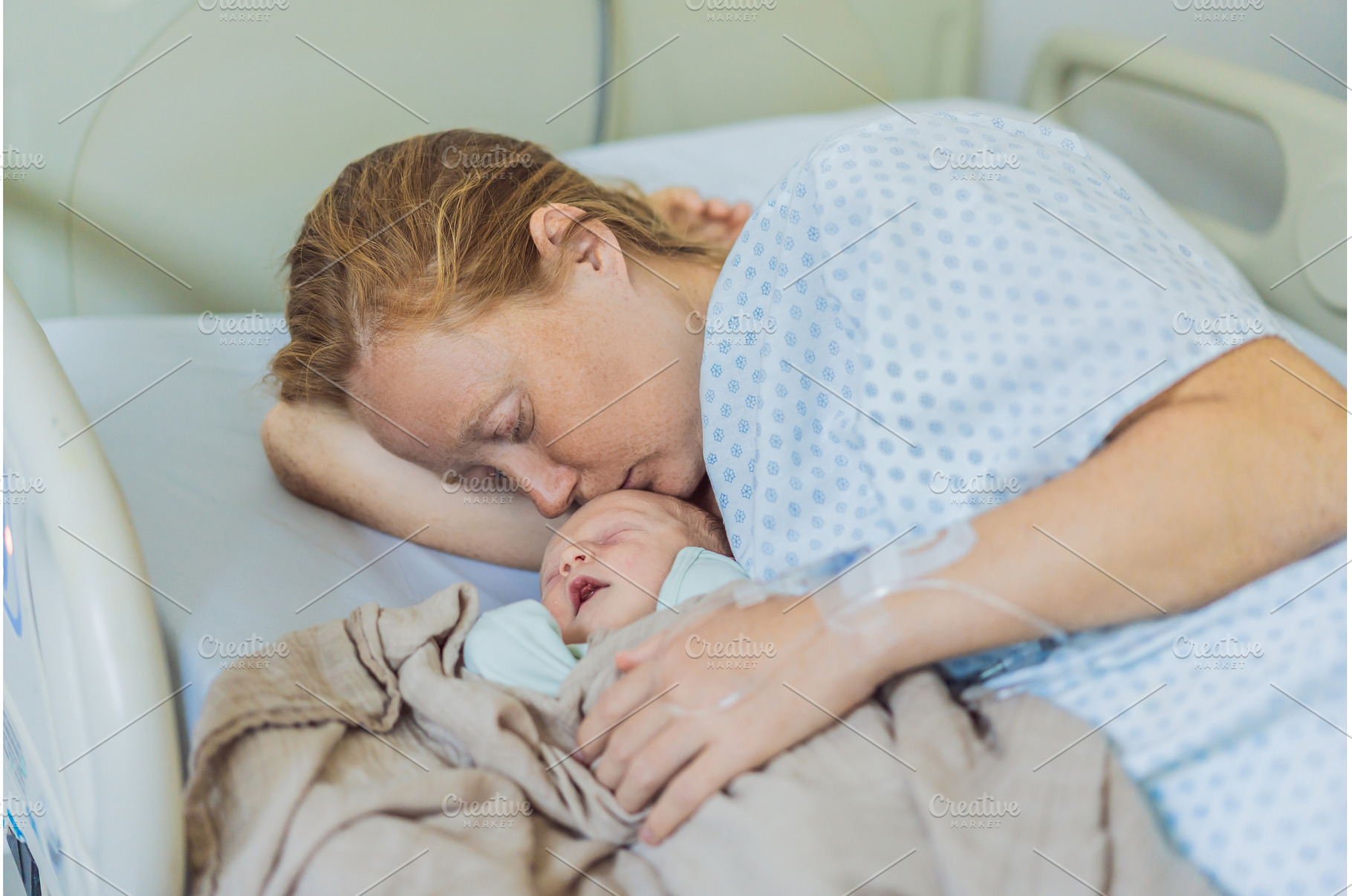 A baby lies with the mother after, a Person Photo by Elizaveta Galitskaya