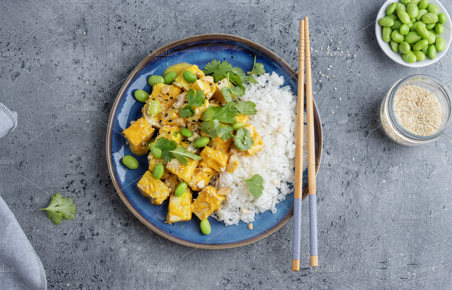 Healthy cooked tofu with sauce and r, a Food & Drink Photo by Valeria Art