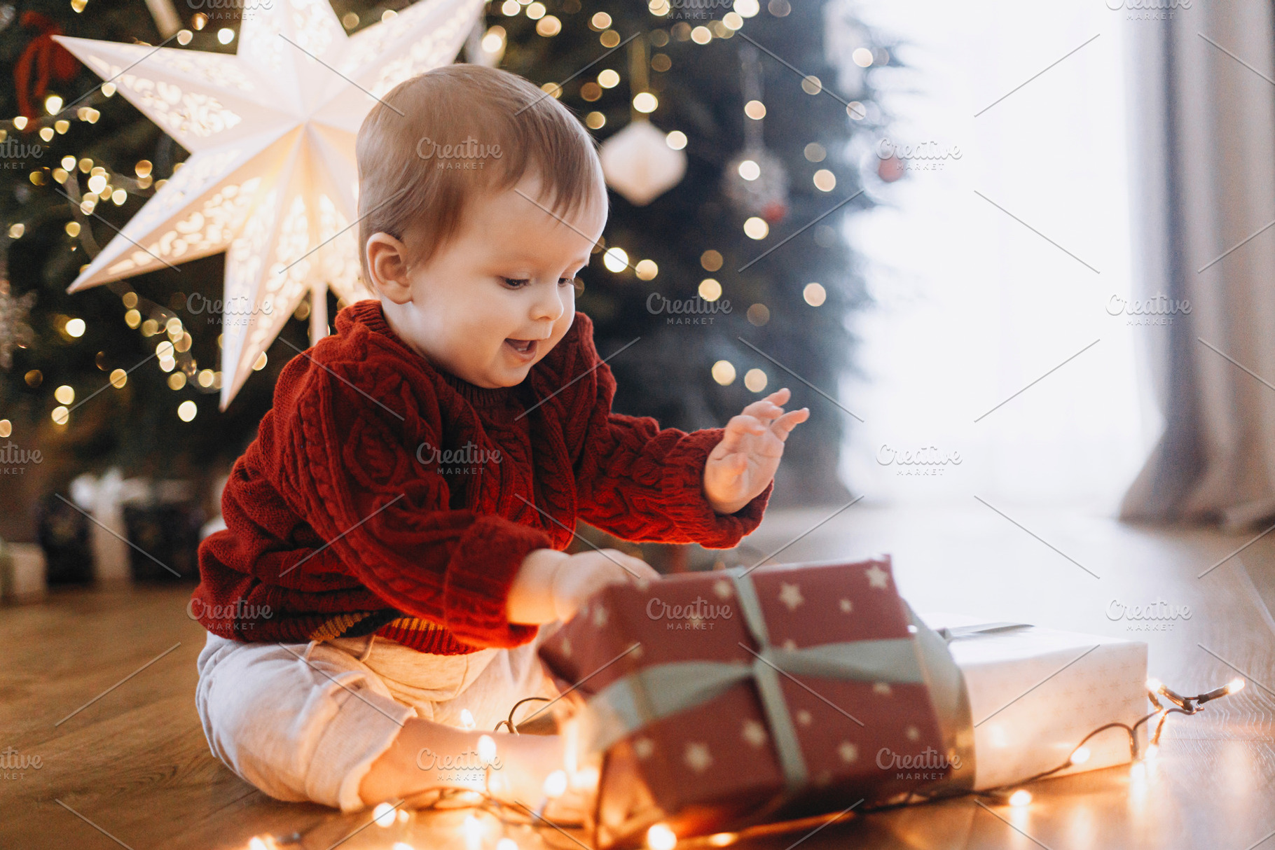 Merry Christmas and Happy Holidays! Cute baby in knitted sweater, a Holiday Photo by Sonjachni