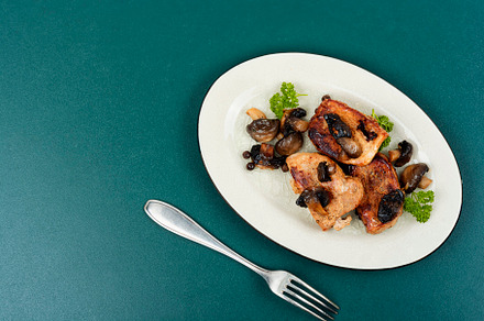 Baked pork medallions with mushrooms, a Food & Drink Photo by MLunov MLunov